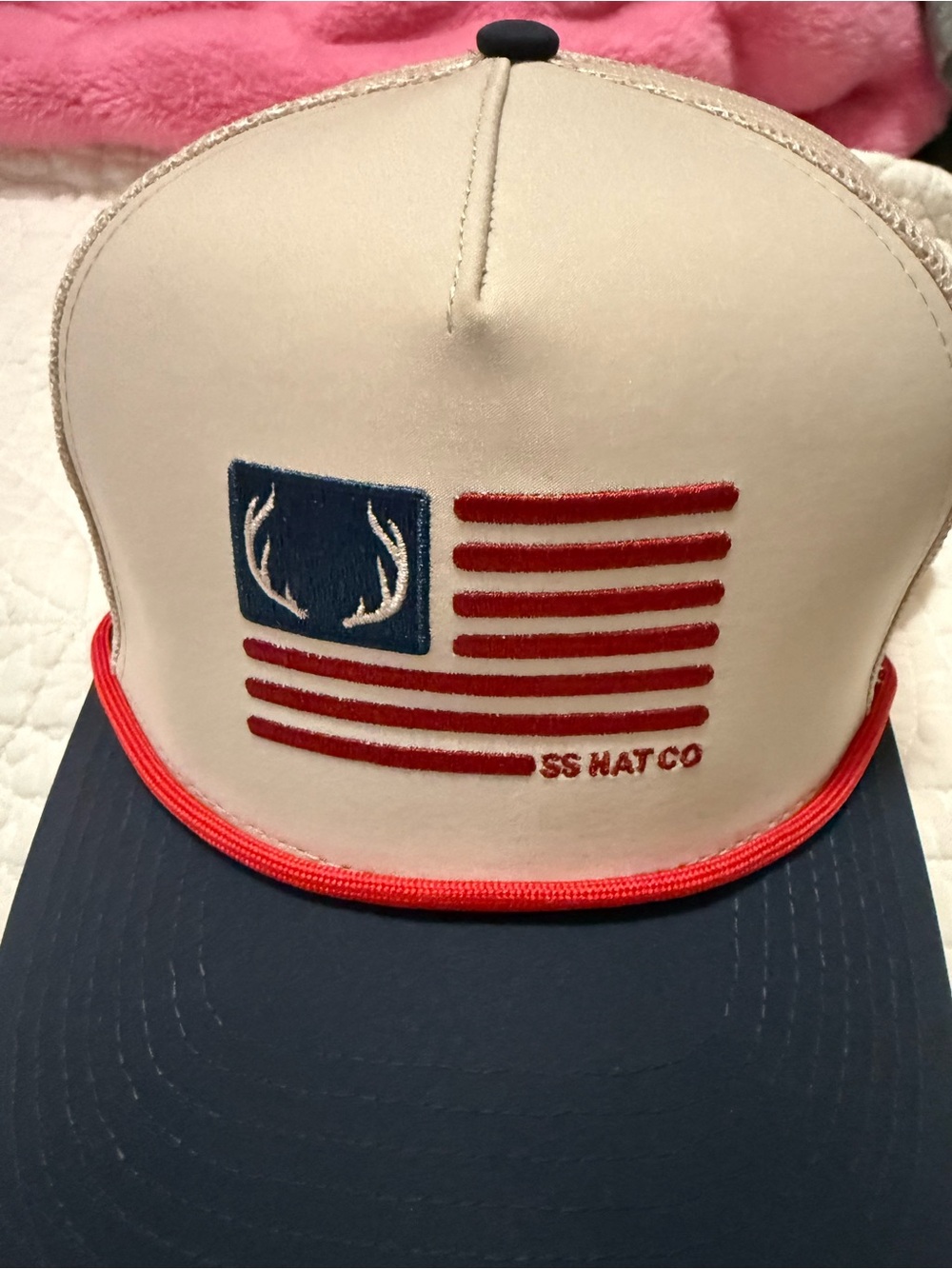 Beige and Navy Trucker Cap with Red Accents
